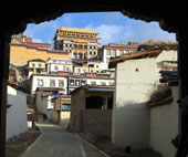 A centuries-old monastery overlooks the town of Shangra-La, along the ancient Tea-Horse Road on The California Native China Tours